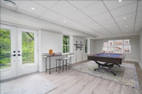 Rec Room with walk-out to pool (virtually staged furnishings) - Country homes for sale and luxury real estate including horse farms and property in the Caledon and King City areas near Toronto